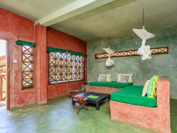 Luxury 2.7-acre creekfront property for sale in Mida Creek Watamu with ocean views, eco-lodge potential, and unique treehouse residence.