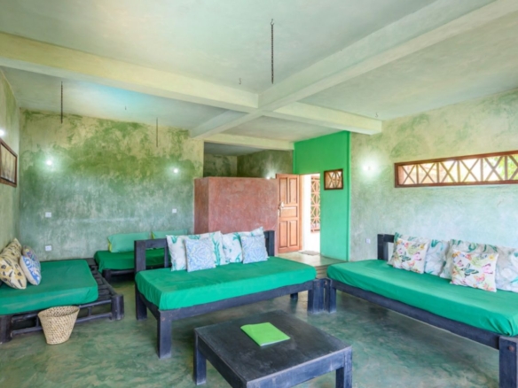 Luxury 2.7-acre creekfront property for sale in Mida Creek Watamu with ocean views, eco-lodge potential, and unique treehouse residence.