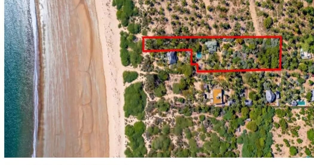 3-bedroom coastal home on 1-acre titled plot in Che Shale with solar panels, rainwater harvesting, balcony, and verandah. Expansion potential on adjoining 3/4-acre land.