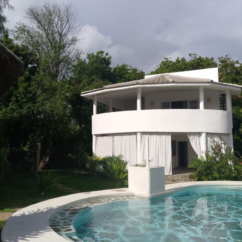 2-bedroom duplex apartment for sale at Iguana Beach Malindi with double kitchen, swimming pool, verandah, and secure low-density compound near Lamu Road.
