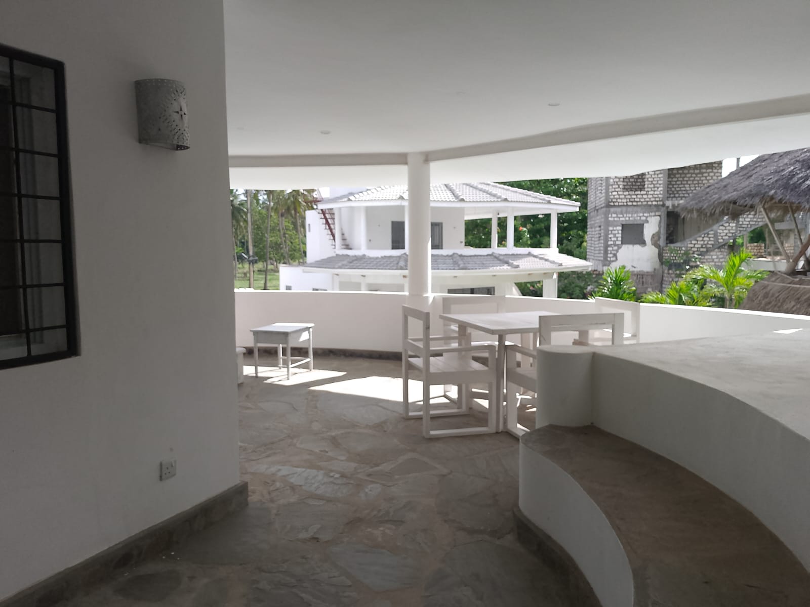 2-bedroom duplex apartment for sale at Iguana Beach Malindi with double kitchen, swimming pool, verandah, and secure low-density compound near Lamu Road.