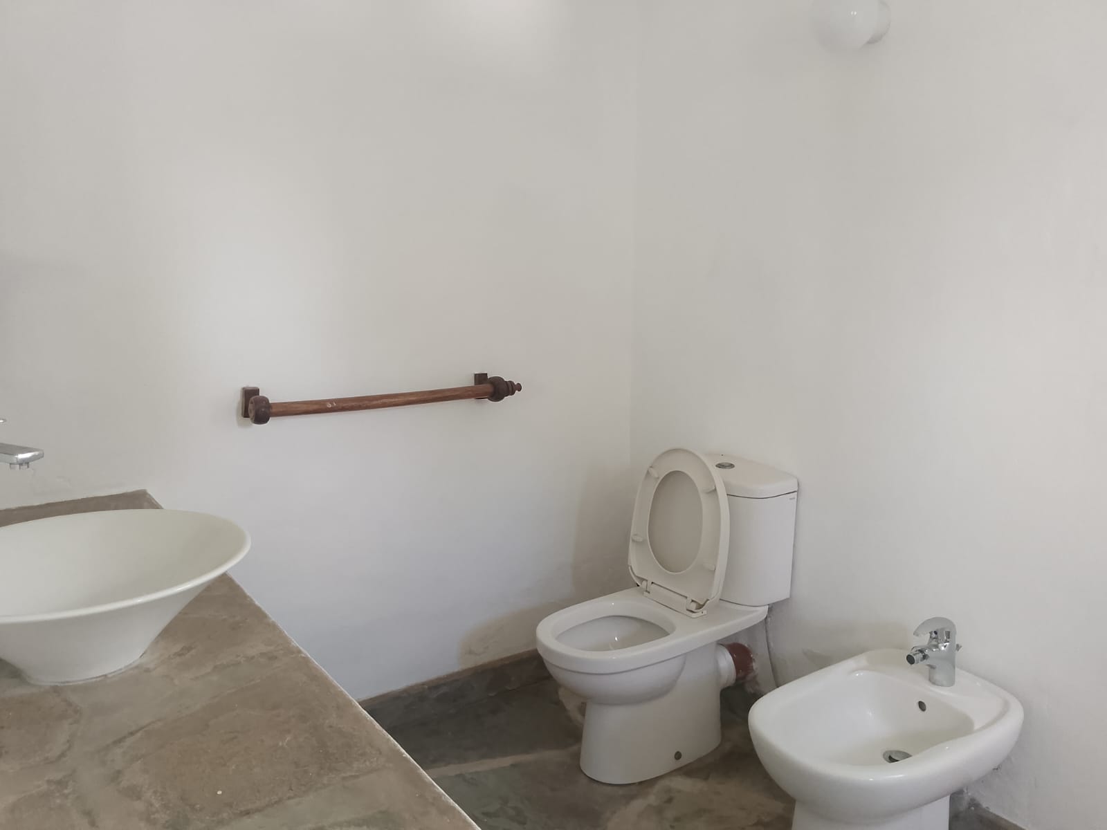 2-bedroom duplex apartment for sale at Iguana Beach Malindi with double kitchen, swimming pool, verandah, and secure low-density compound near Lamu Road.