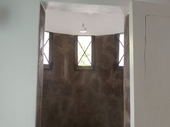 2-bedroom duplex apartment for sale at Iguana Beach Malindi with double kitchen, swimming pool, verandah, and secure low-density compound near Lamu Road.