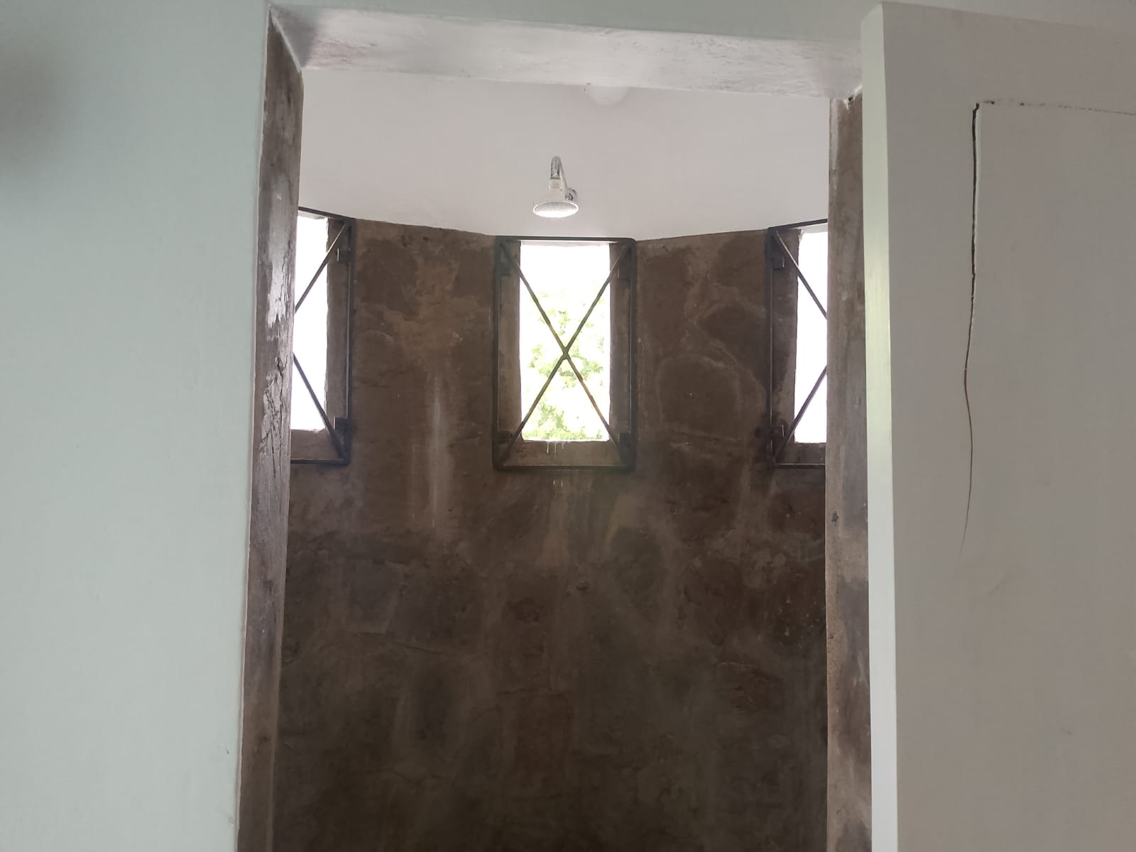 2-bedroom duplex apartment for sale at Iguana Beach Malindi with double kitchen, swimming pool, verandah, and secure low-density compound near Lamu Road.