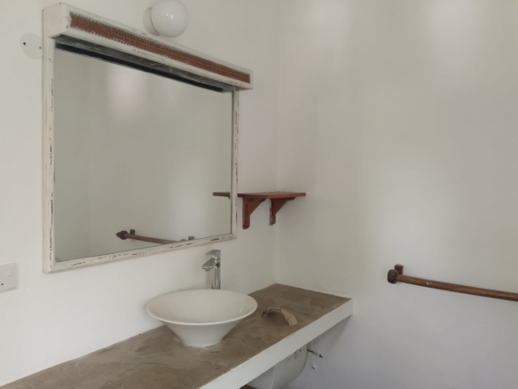 2-bedroom duplex apartment for sale at Iguana Beach Malindi with double kitchen, swimming pool, verandah, and secure low-density compound near Lamu Road.