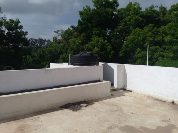2-bedroom duplex apartment for sale at Iguana Beach Malindi with double kitchen, swimming pool, verandah, and secure low-density compound near Lamu Road.