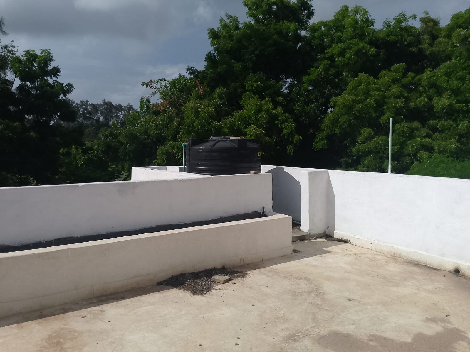 2-bedroom duplex apartment for sale at Iguana Beach Malindi with double kitchen, swimming pool, verandah, and secure low-density compound near Lamu Road.