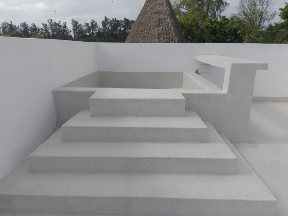 Luxury 2-bedroom duplex apartment at Iguana Beach Malindi with rooftop pool, double kitchen, verandah, and secure low-density compound near Lamu Road.