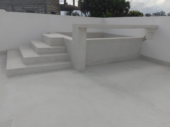 Luxury 2-bedroom duplex apartment at Iguana Beach Malindi with rooftop pool, double kitchen, verandah, and secure low-density compound near Lamu Road.