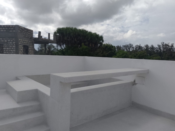 Luxury 2-bedroom duplex apartment at Iguana Beach Malindi with rooftop pool, double kitchen, verandah, and secure low-density compound near Lamu Road.