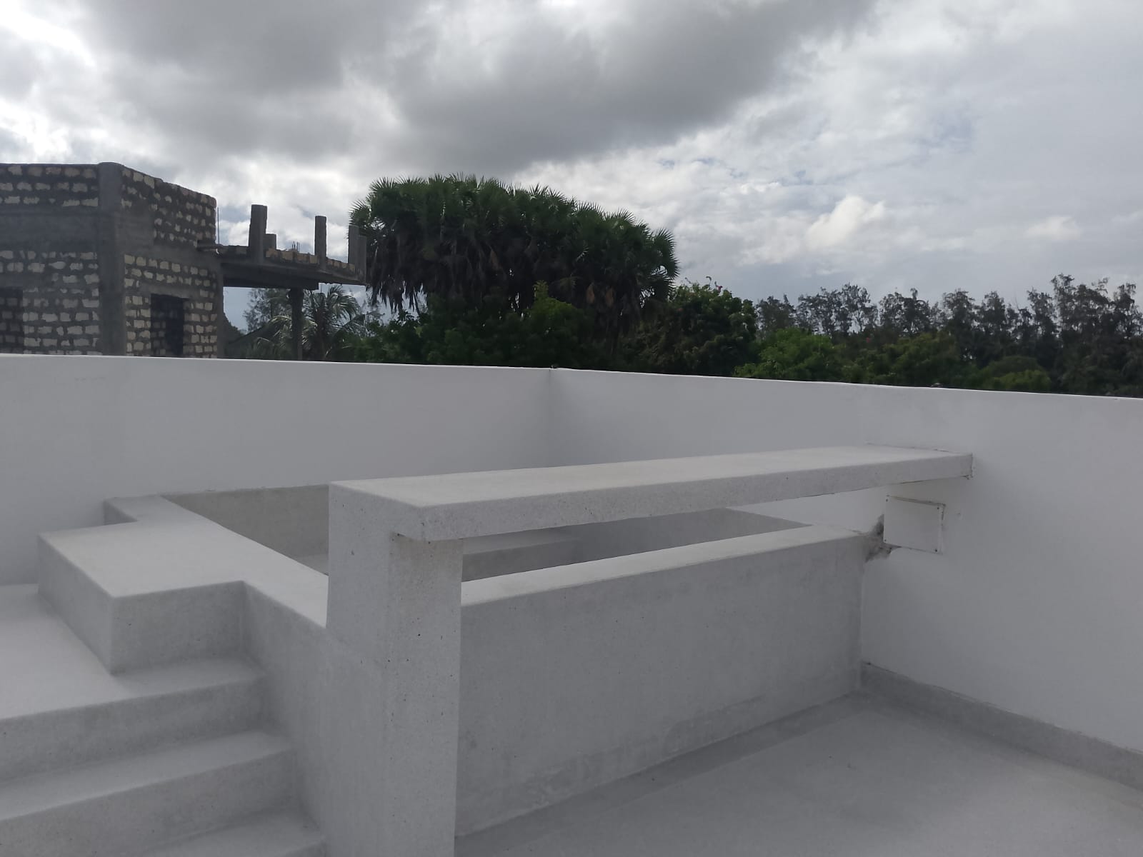 Luxury 2-bedroom duplex apartment at Iguana Beach Malindi with rooftop pool, double kitchen, verandah, and secure low-density compound near Lamu Road.