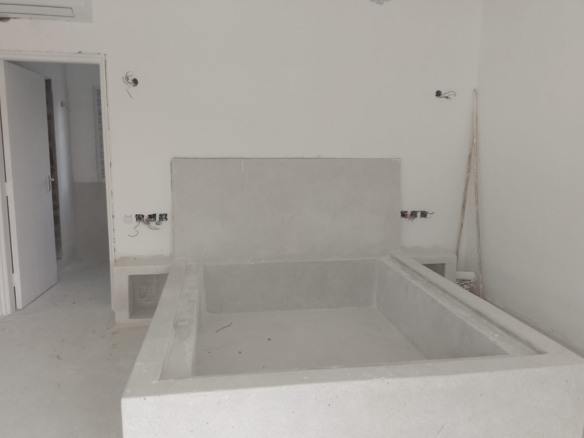 Luxury 2-bedroom duplex apartment at Iguana Beach Malindi with rooftop pool, double kitchen, verandah, and secure low-density compound near Lamu Road.