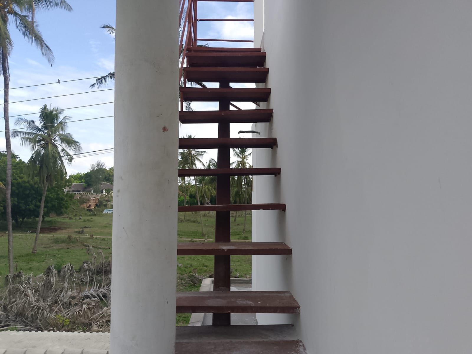 Luxury 2-bedroom duplex apartment at Iguana Beach Malindi with rooftop pool, double kitchen, verandah, and secure low-density compound near Lamu Road.