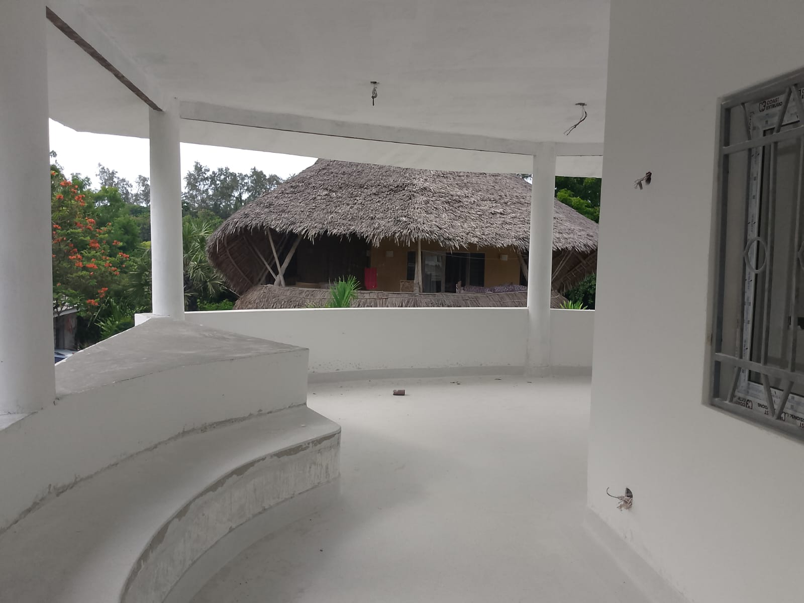 Luxury 2-bedroom duplex apartment at Iguana Beach Malindi with rooftop pool, double kitchen, verandah, and secure low-density compound near Lamu Road.