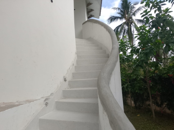Luxury 2-bedroom duplex apartment at Iguana Beach Malindi with rooftop pool, double kitchen, verandah, and secure low-density compound near Lamu Road.