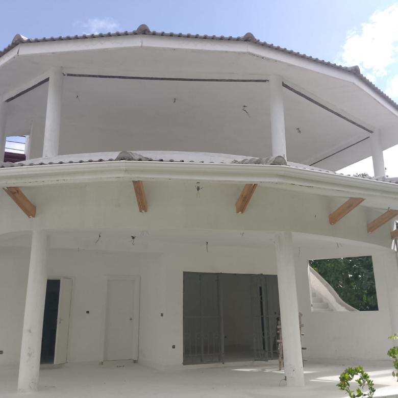 Luxury 2-bedroom duplex apartment at Iguana Beach Malindi with rooftop pool, double kitchen, verandah, and secure low-density compound near Lamu Road.