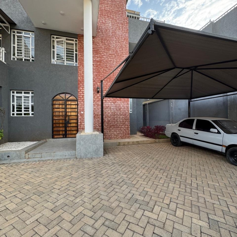 Luxury 4-bedroom house with DSQ for sale in gated community featuring solar panels, modern finishes, and premium amenities.