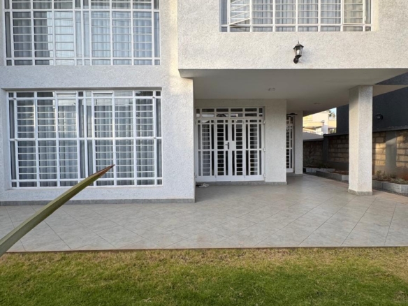 Modern 4BR home with DSQ in gated community. Solar power, premium finishes, pool & clubhouse. Prime investment at Ksh 32.5M.