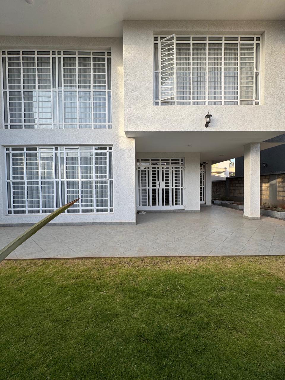 Modern 4BR home with DSQ in gated community. Solar power, premium finishes, pool & clubhouse. Prime investment at Ksh 32.5M.
