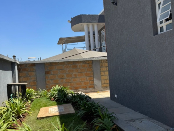Luxury 4-bedroom house with DSQ for sale in gated community featuring solar panels, modern finishes, and premium amenities.
