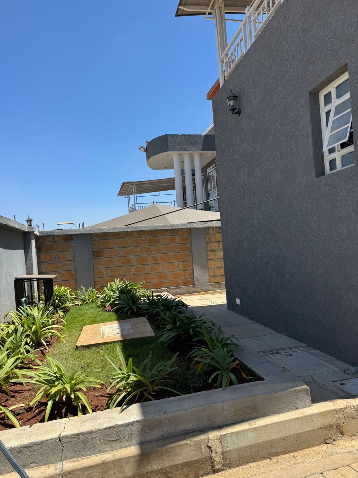 Luxury 4-bedroom house with DSQ for sale in gated community featuring solar panels, modern finishes, and premium amenities.