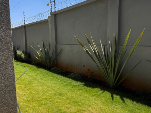 Luxury 4-bedroom house with DSQ for sale in gated community featuring solar panels, modern finishes, and premium amenities.