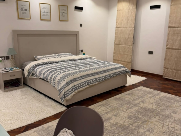 Luxury 4-bedroom house with DSQ for sale in gated community featuring solar panels, modern finishes, and premium amenities.