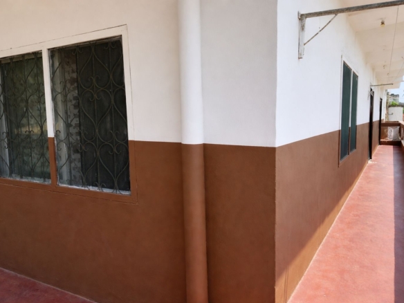 Apartment block for sale in Majengo Malindi with 10 units generating KES 110,000 monthly income, expandable structure and road frontage.