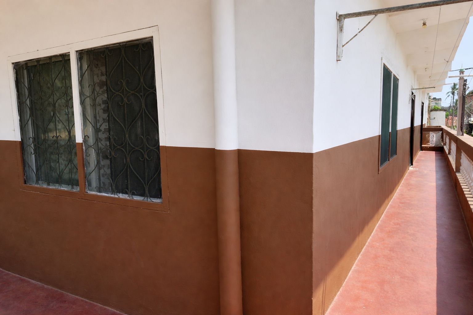 Apartment block for sale in Majengo Malindi with 10 units generating KES 110,000 monthly income, expandable structure and road frontage.