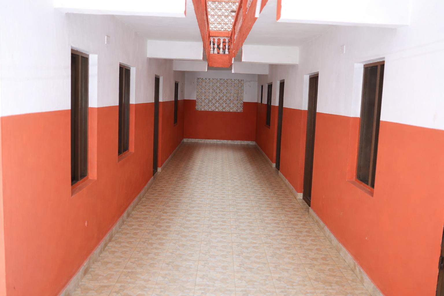 Apartment block for sale in Majengo Malindi with 10 units generating KES 110,000 monthly income, expandable structure and road frontage.