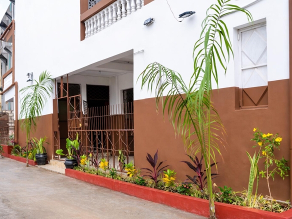 Apartment block for sale in Majengo Malindi with 10 units generating KES 110,000 monthly income, expandable structure and road frontage.