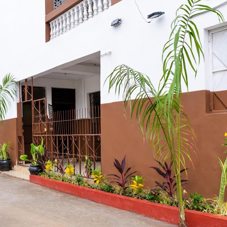 Apartment block for sale in Majengo Malindi with 10 units generating KES 110,000 monthly income, expandable structure and road frontage.