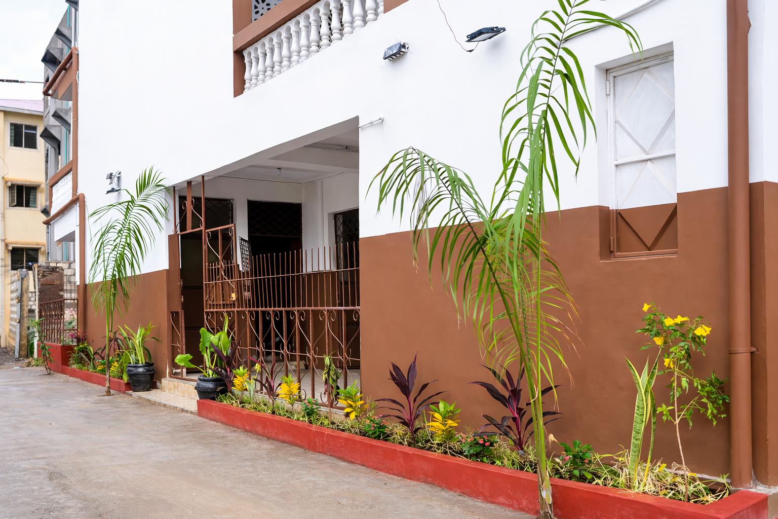 Apartment block for sale in Majengo Malindi with 10 units generating KES 110,000 monthly income, expandable structure and road frontage.
