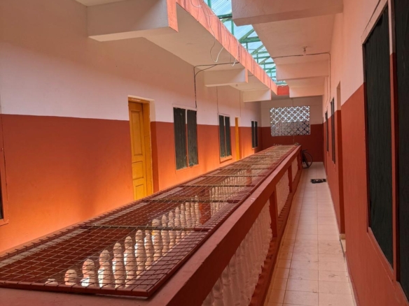 Apartment block for sale in Majengo Malindi with 10 units generating KES 110,000 monthly income, expandable structure and road frontage.