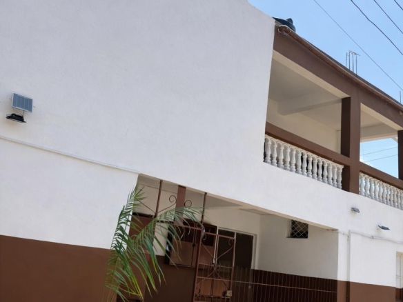 Apartment block for sale in Majengo Malindi with 10 units generating KES 110,000 monthly income, expandable structure and road frontage.
