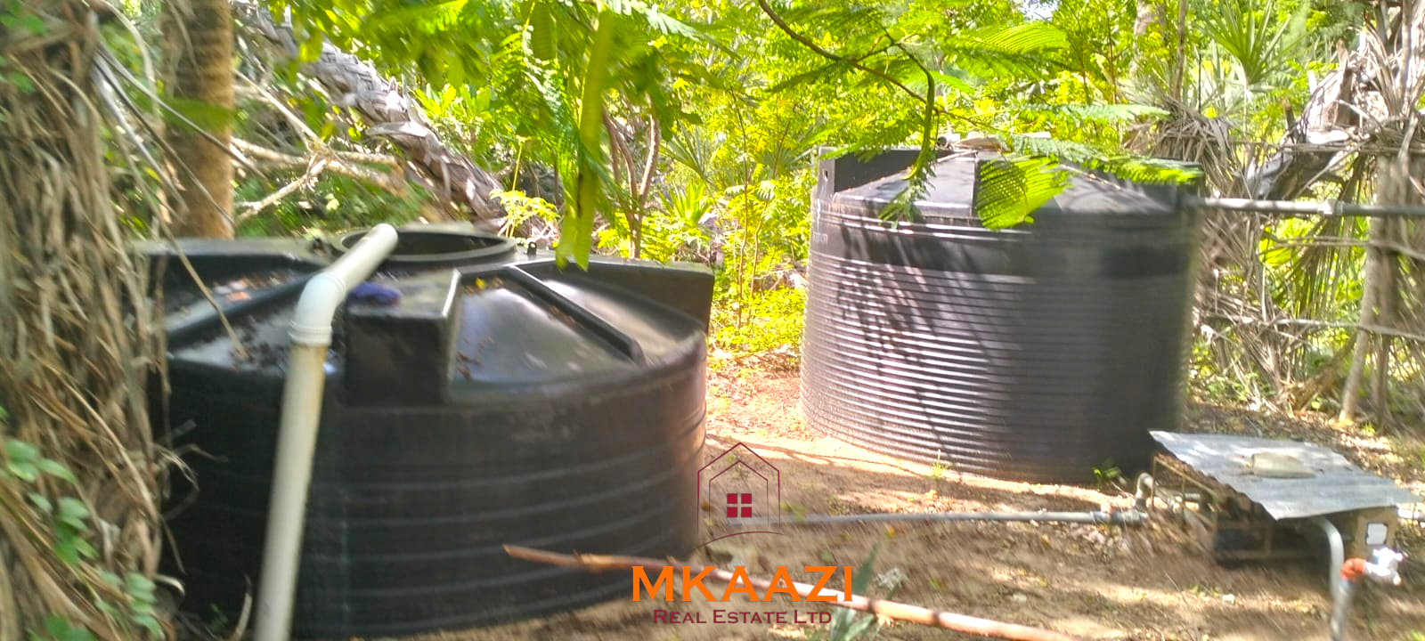 3-bedroom coastal home on 1-acre titled plot in Che Shale with solar panels, rainwater harvesting, balcony, and verandah. Expansion potential on adjoining 3/4-acre land.