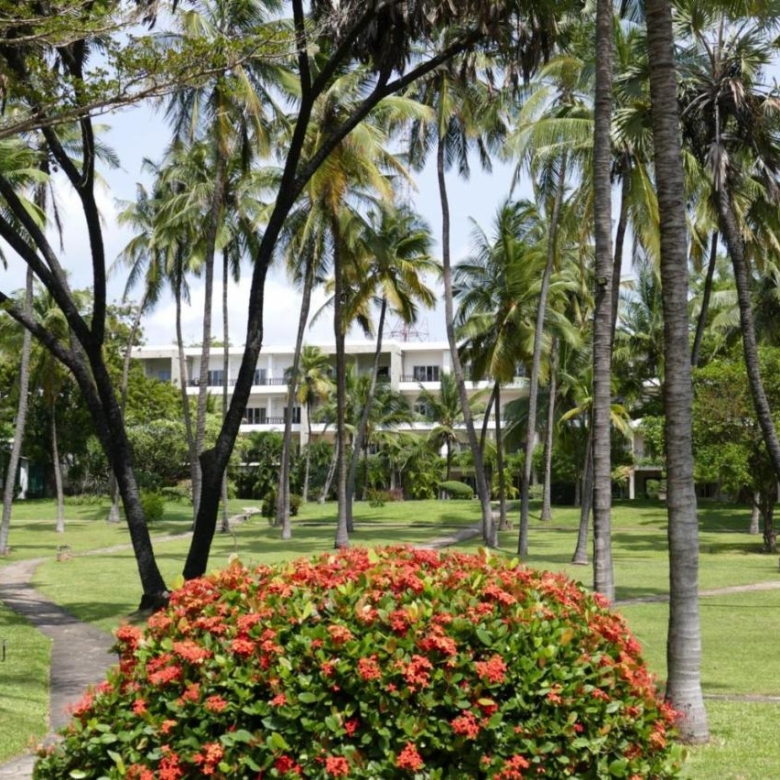 2-bedroom beachfront apartment for rent at Lawfords Malindi with swimming pools, gardens, entertainment facilities, and ocean views.
