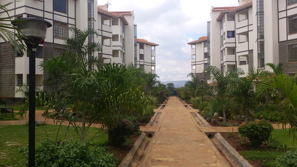 2-bedroom apartment for sale in Athi River at Sunset Boulevard Estate with tenant, balcony, and close proximity to Mombasa Road and malls.