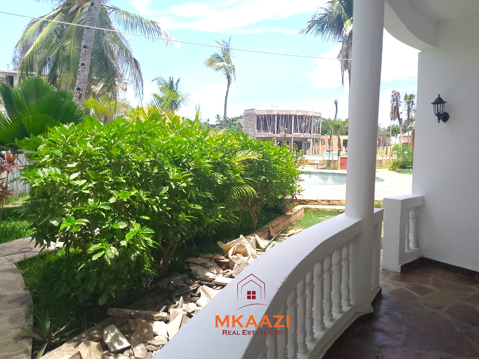 Block of 4 two-bedroom apartments for sale on Silversands Road Malindi with rooftop terrace, swimming pool, and Airbnb investment potential.