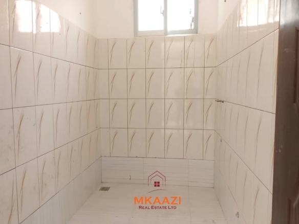 Block of 4 two-bedroom apartments for sale on Silversands Road Malindi with rooftop terrace, swimming pool, and Airbnb investment potential.