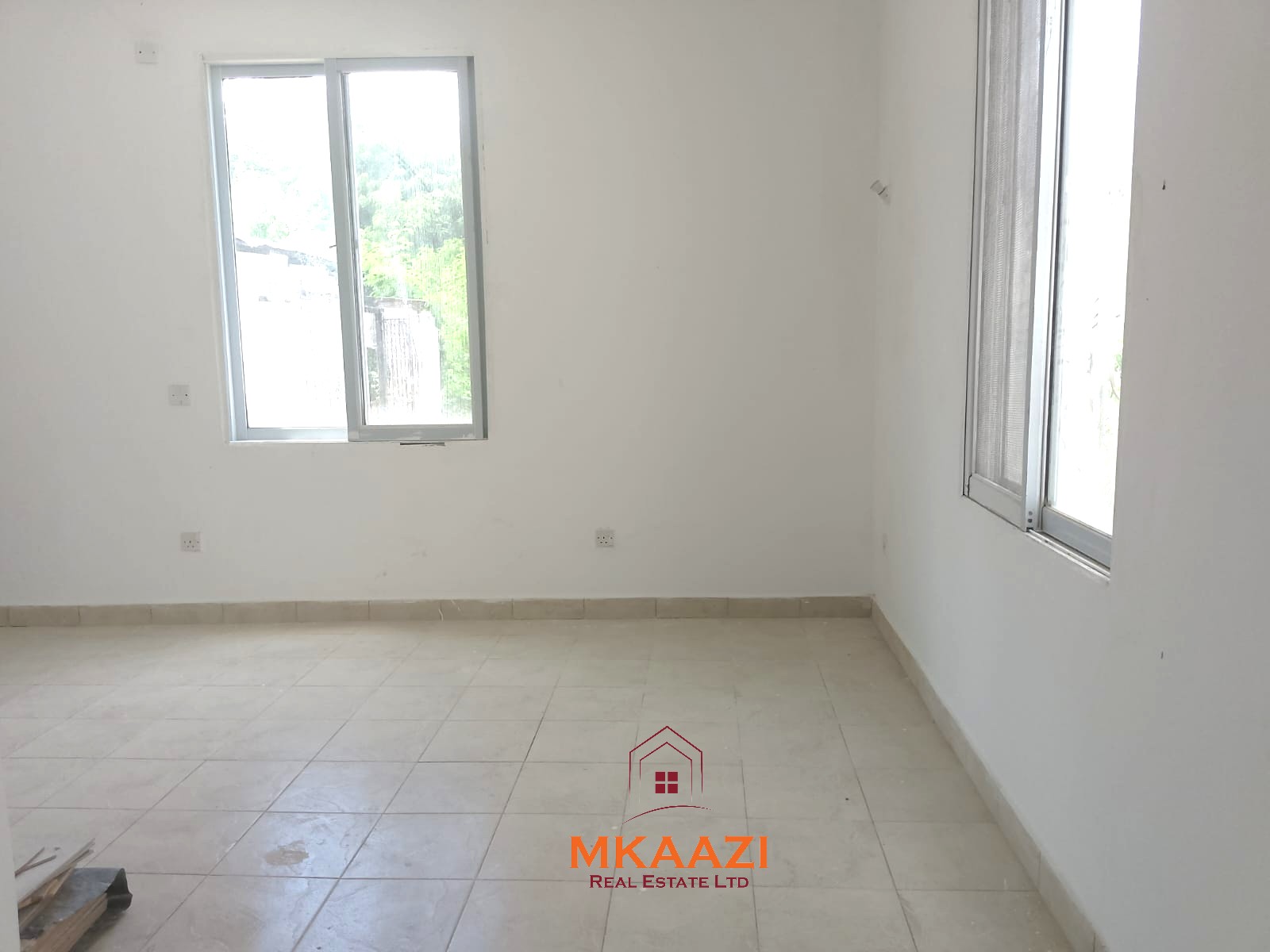Block of 4 two-bedroom apartments for sale on Silversands Road Malindi with rooftop terrace, swimming pool, and Airbnb investment potential.
