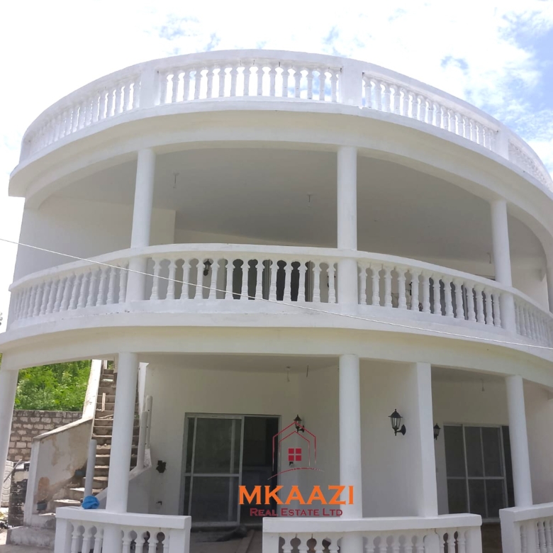 Block of 4 two-bedroom apartments for sale on Silversands Road Malindi with rooftop terrace, swimming pool, and Airbnb investment potential.