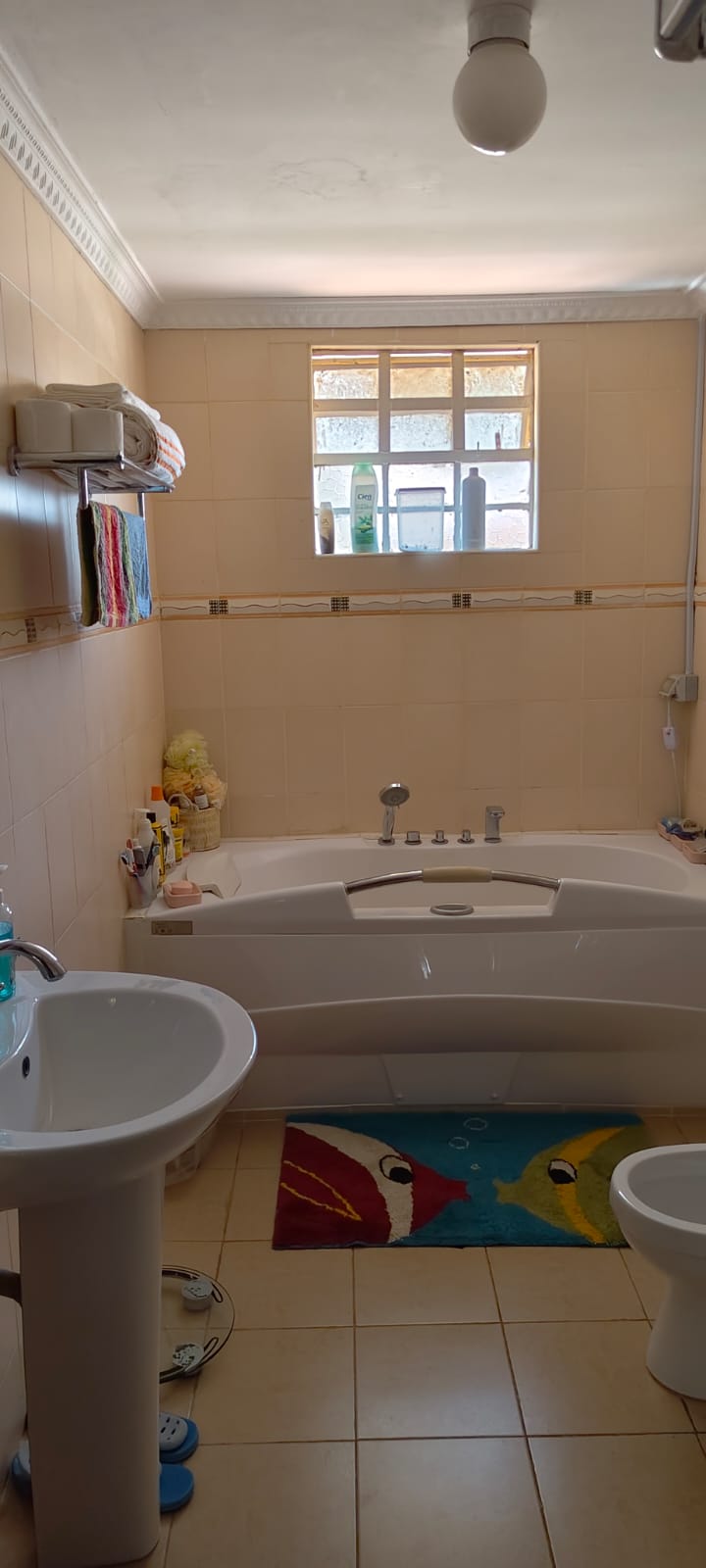 4 bedroom house for sale in Kitengela with DSQ gated estate highway frontage 50x100 plot KES 15M