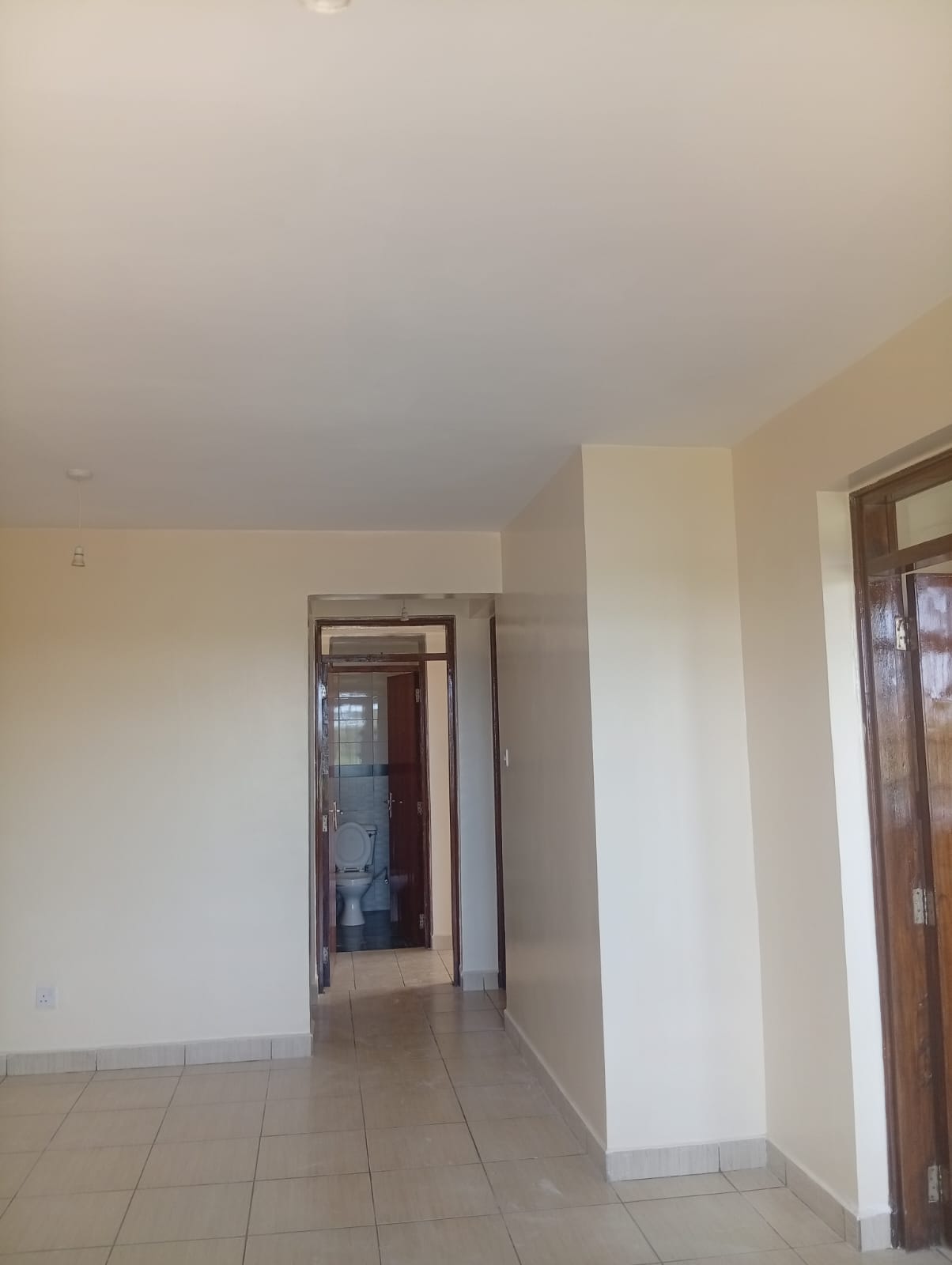 2-bedroom apartment for sale in Athi River at Sunset Boulevard Estate with tenant, balcony, and close proximity to Mombasa Road and malls.