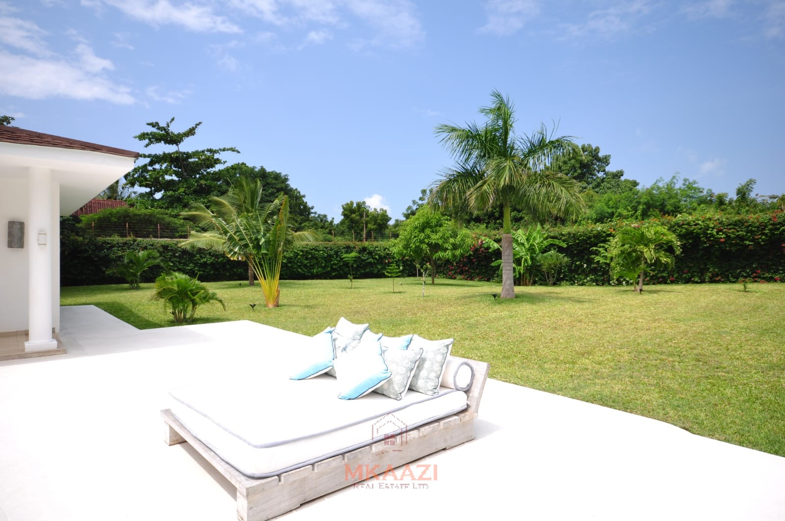 Luxury 4-bedroom villa for sale in Malindi near Casuarina Road with pool, landscaped gardens, staff quarters, and high-end finishes on 1.25 acres.