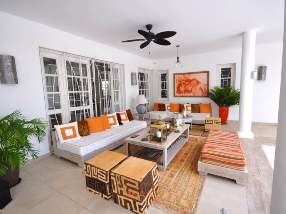 Luxury 4-bedroom villa for sale in Malindi near Casuarina Road with pool, landscaped gardens, staff quarters, and high-end finishes on 1.25 acres.