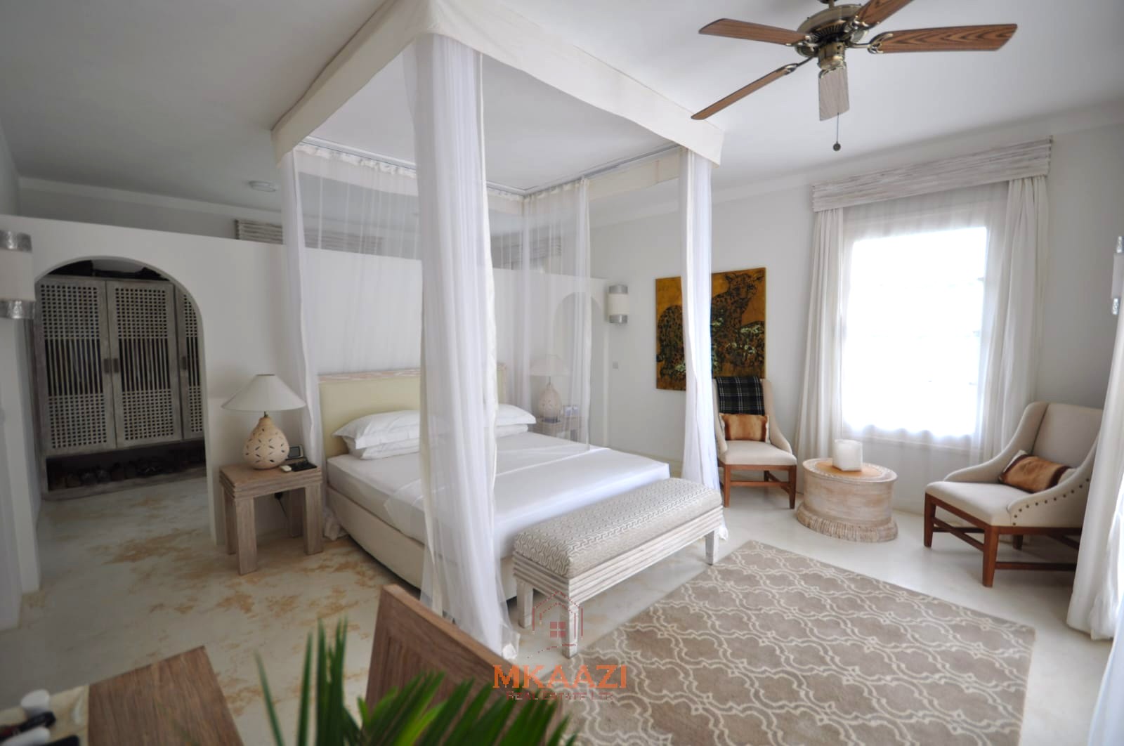 Luxury 4-bedroom villa for sale in Malindi near Casuarina Road with pool, landscaped gardens, staff quarters, and high-end finishes on 1.25 acres.