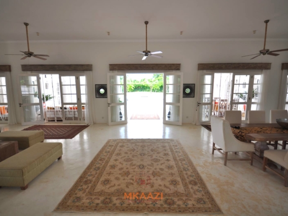 Luxury 4-bedroom villa for sale in Malindi near Casuarina Road with pool, landscaped gardens, staff quarters, and high-end finishes on 1.25 acres.
