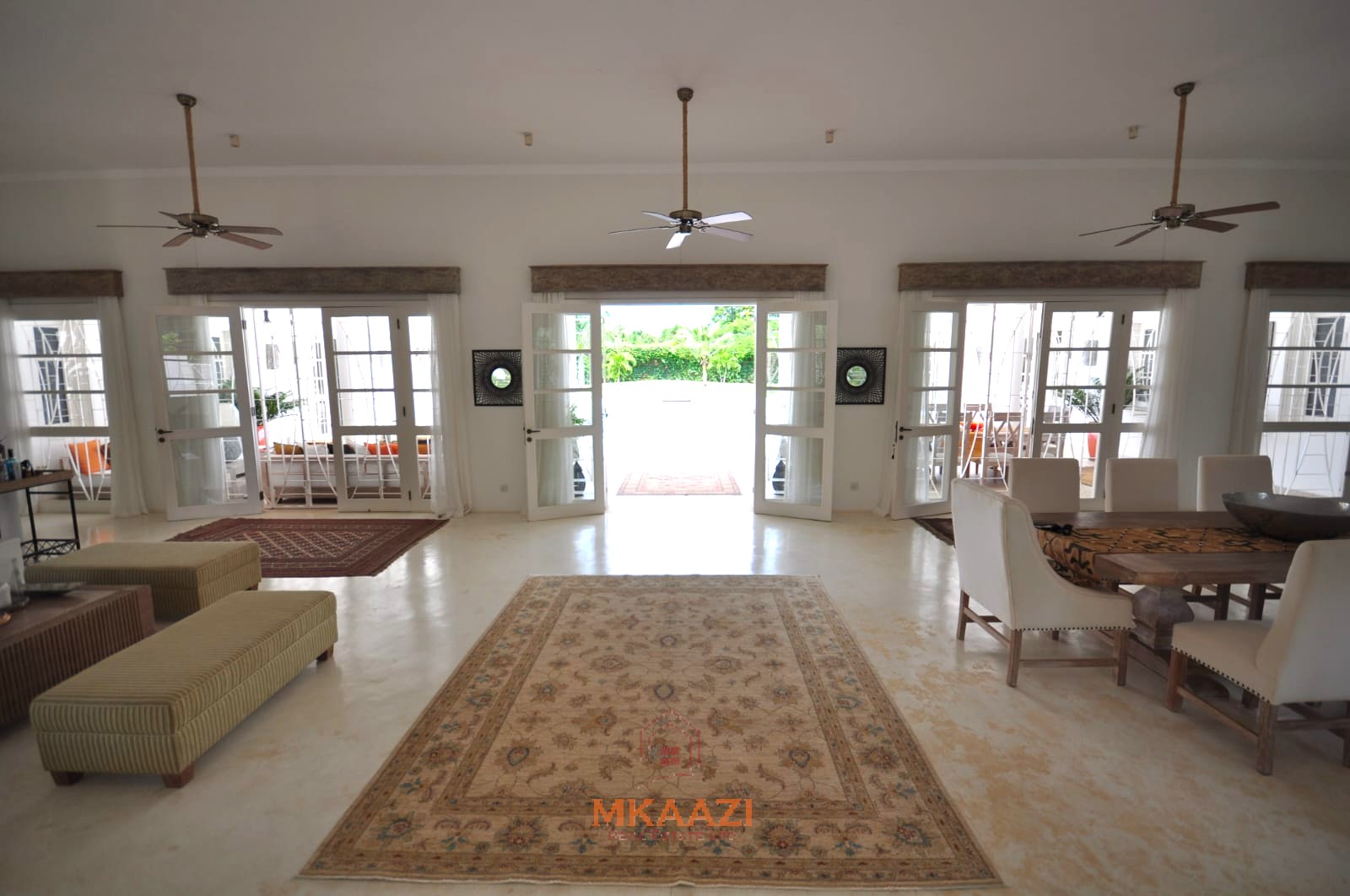 Luxury 4-bedroom villa for sale in Malindi near Casuarina Road with pool, landscaped gardens, staff quarters, and high-end finishes on 1.25 acres.