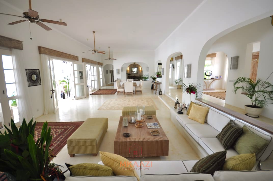 Luxury 4-bedroom villa for sale in Malindi near Casuarina Road with pool, landscaped gardens, staff quarters, and high-end finishes on 1.25 acres.